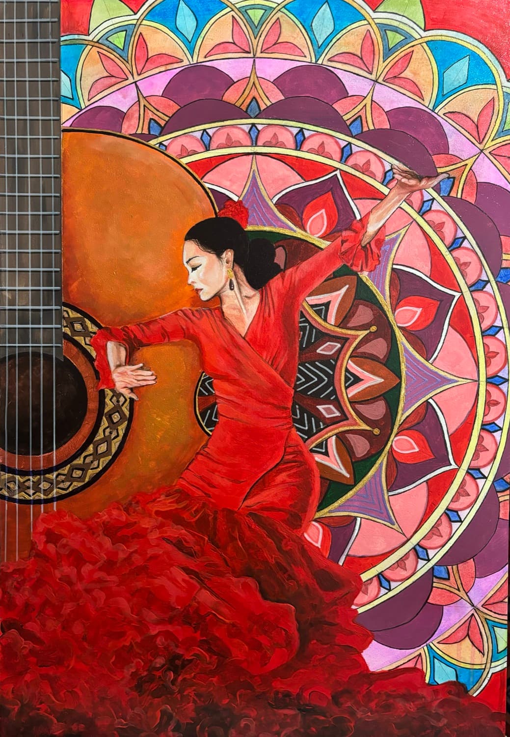 Painting of a flamenco dancer in red against a mandala